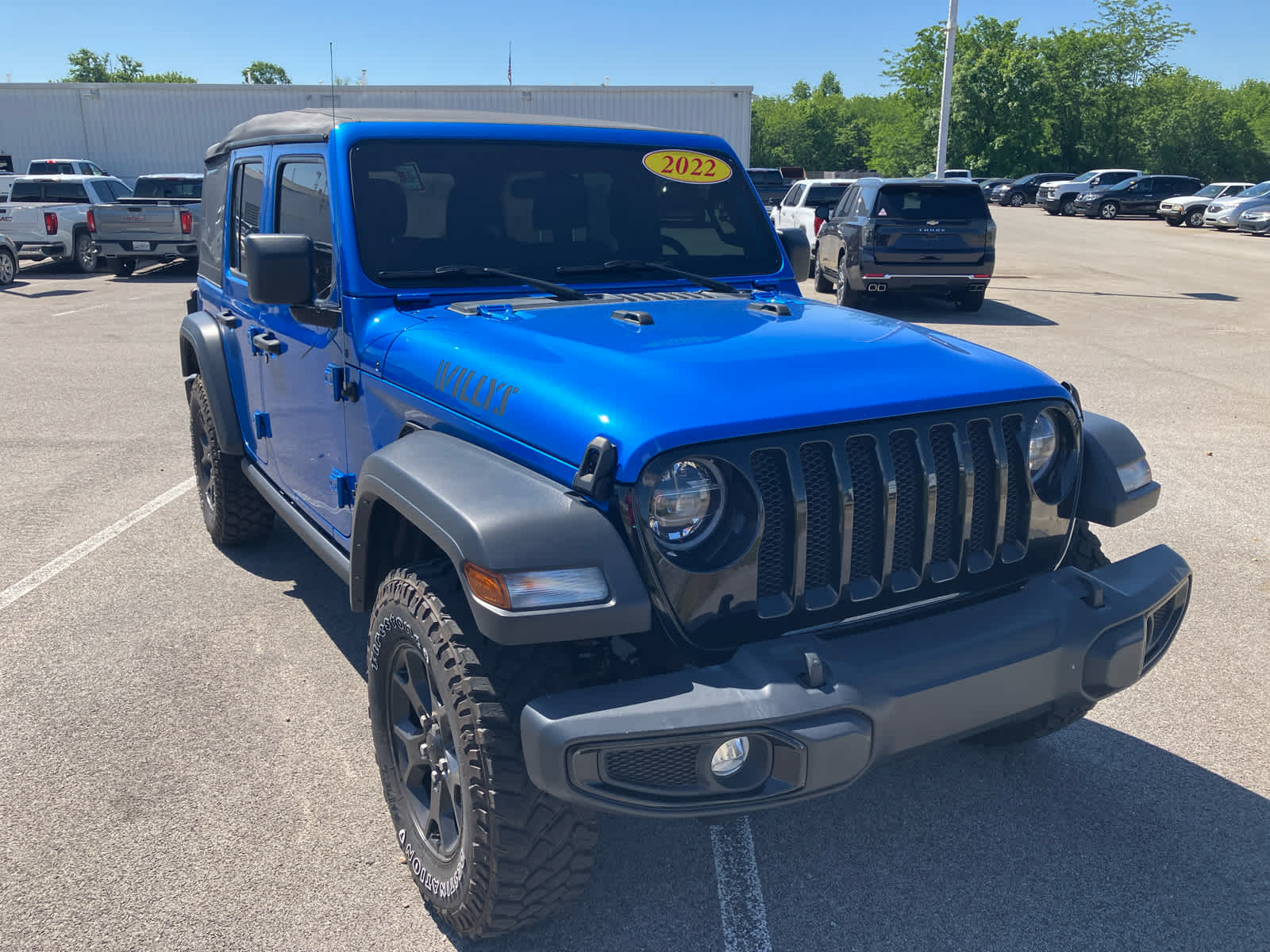 2022 Jeep Wrangler Unlimited Willys in Hydro Blue Pear — front three-quarter view
