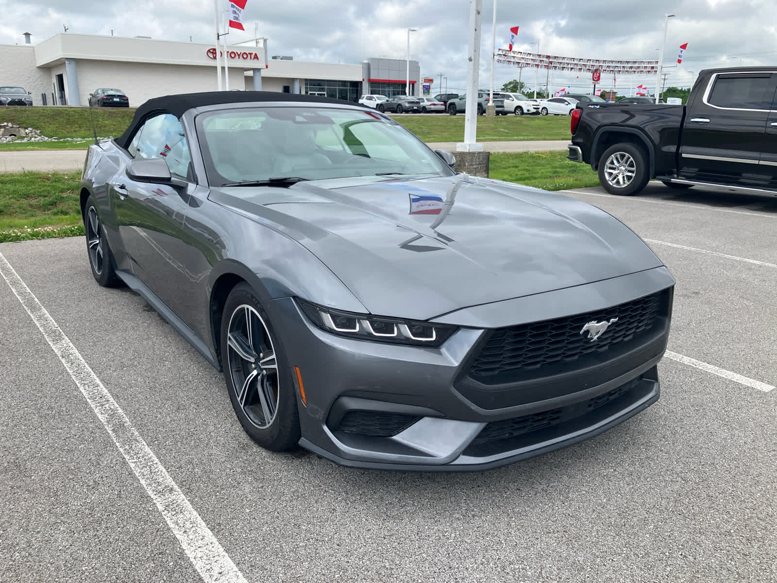 2024 Ford Mustang EcoBoost in Carbonized Gray — front three-quarter view