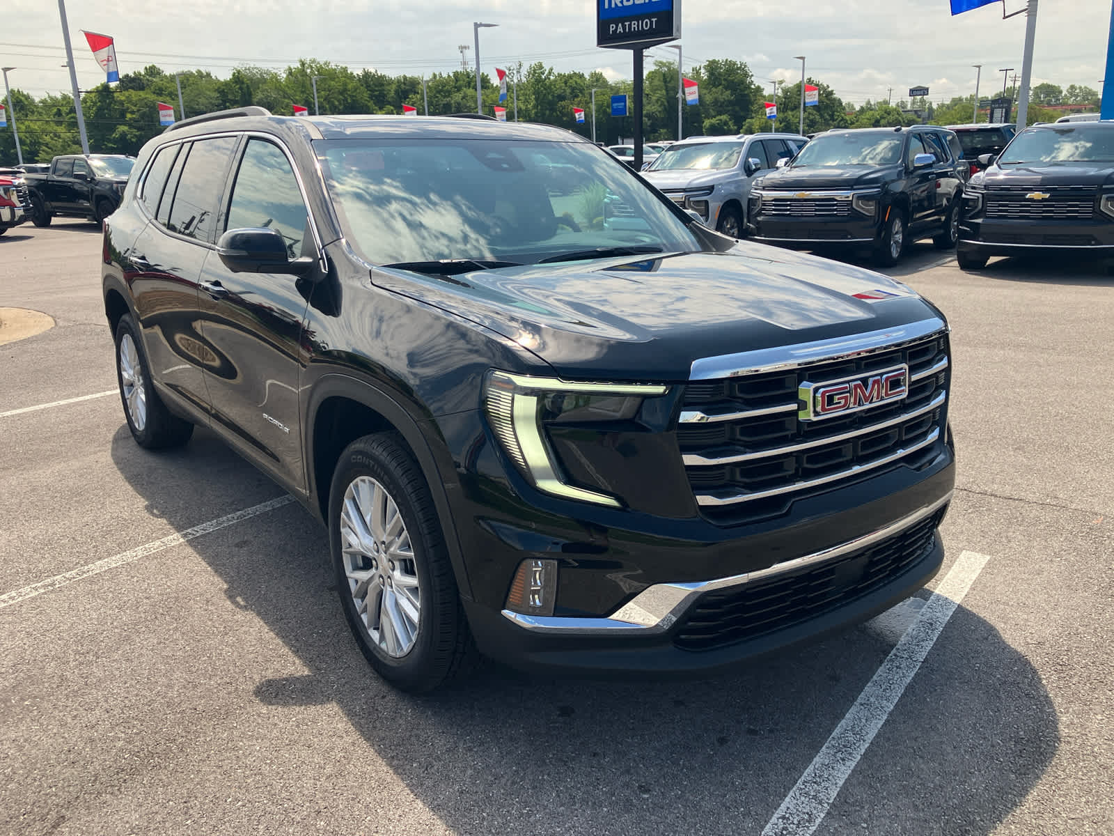 2026 GMC Acadia Elevation in Ebony Twilight Metallic — front three-quarter view