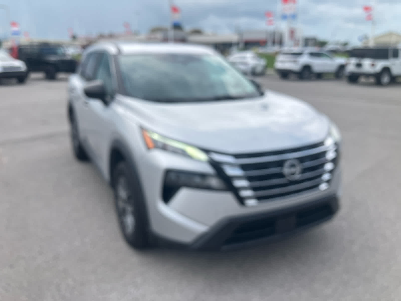 2024 Nissan Rogue S in Brilliant Silve — front three-quarter view