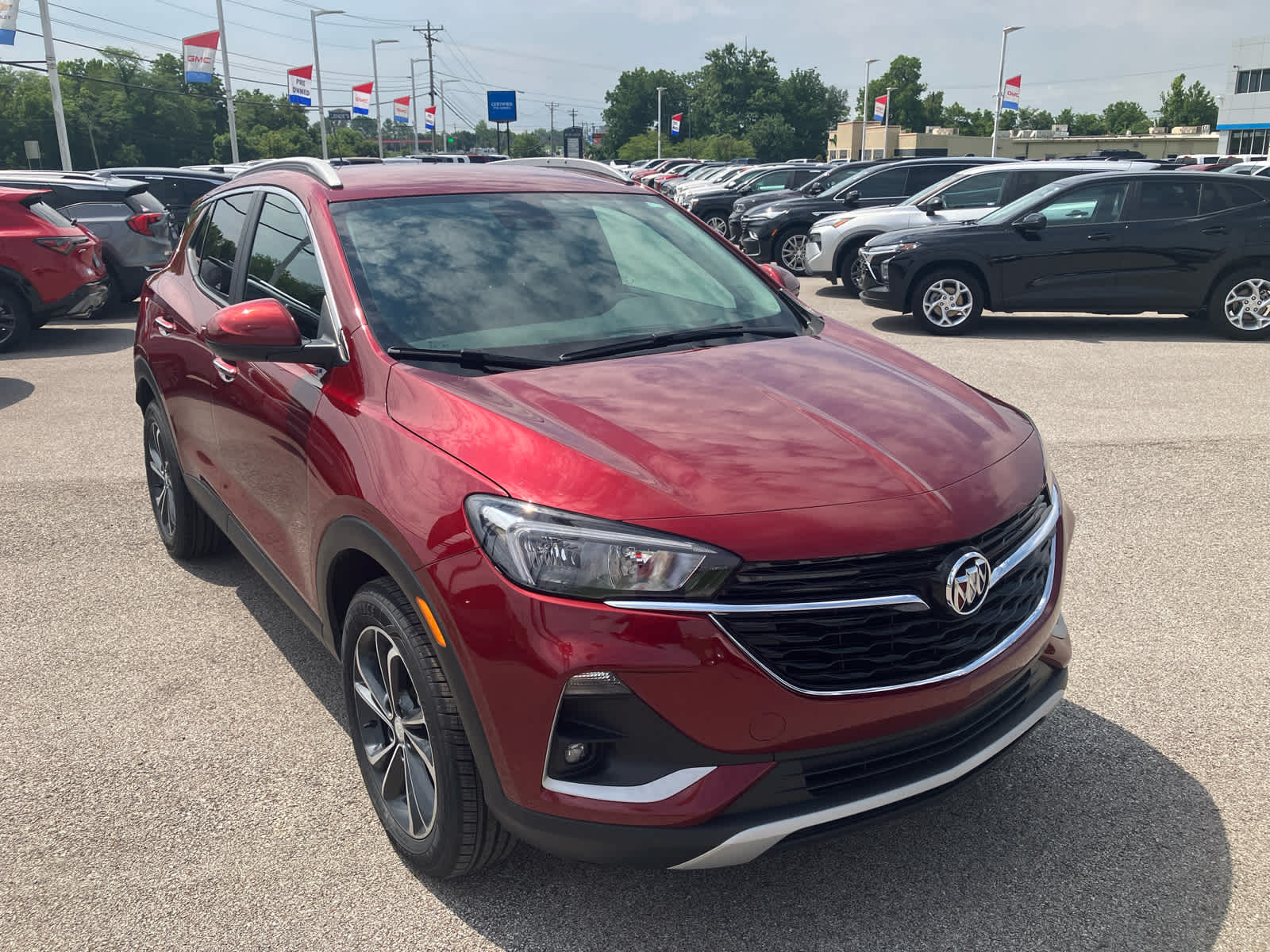 2023 Buick Encore GX Select in Cinnabar Metallic — front three-quarter view