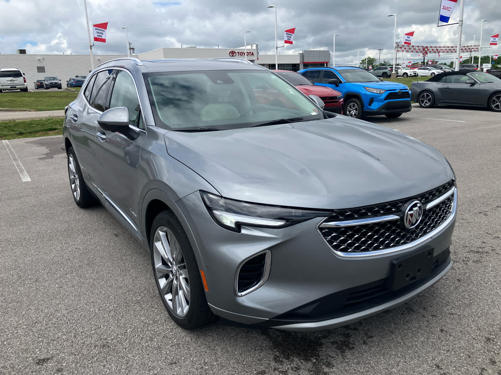 2023 Buick Envision Avenir in Moonstone Gray Metallic — front three-quarter view